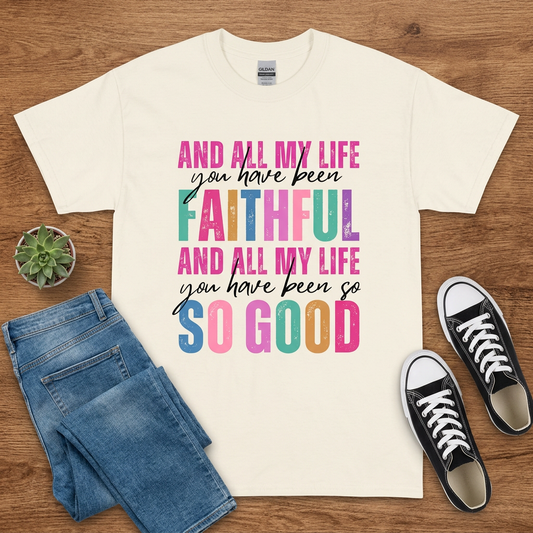 Cream All My Life You Have Been Faithful T-shirt flat lay on brown wood with jeans and black sneakers